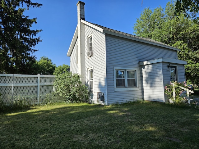 8991 W 1 Mile Rd, Hesperia, MI 49421 - view of side of home with a chimney