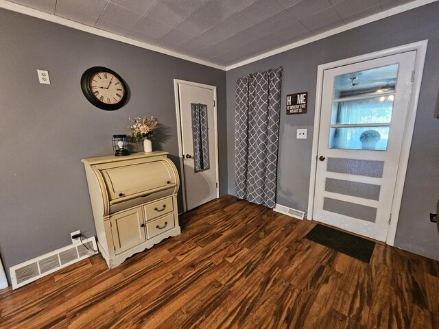 8991 W 1 Mile Rd, Hesperia, MI 49421 - foyer with dark wood-type flooring and ornamental molding
