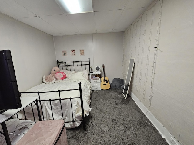8991 W 1 Mile Rd, Hesperia, MI 49421 - carpeted bedroom featuring a paneled ceiling and baseboards