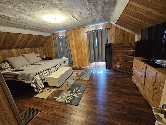 8991 W 1 Mile Rd, Hesperia, MI 49421 - bedroom featuring wood walls, lofted ceiling, and wood finished floors