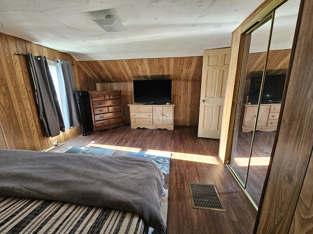 8991 W 1 Mile Rd, Hesperia, MI 49421 - bedroom featuring dark wood finished floors, wood walls, and lofted ceiling