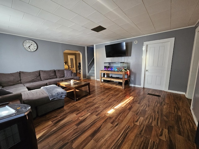 8991 W 1 Mile Rd, Hesperia, MI 49421 - living area with arched walkways, ornamental molding, and wood finished floors