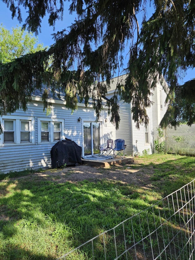 8991 W 1 Mile Rd, Hesperia, MI 49421 - back of house featuring a deck