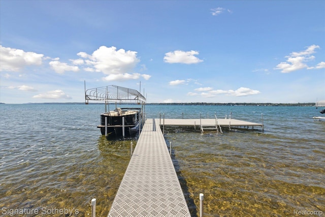 4294 N E Torch Lake Dr, Central Lake, MI 49622 - dock area with a water view