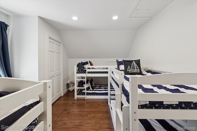 4294 N E Torch Lake Dr, Central Lake, MI 49622 - bedroom with lofted ceiling, recessed lighting, and wood finished floors