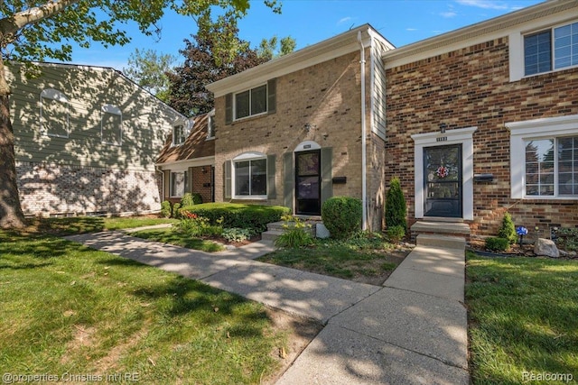 1982 Wickham St, Royal Oak, MI 48073 - view of front facade with brick siding and a front lawn