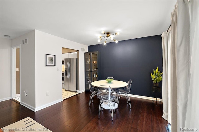 1982 Wickham St, Royal Oak, MI 48073 - dining room with a chandelier and wood-type flooring