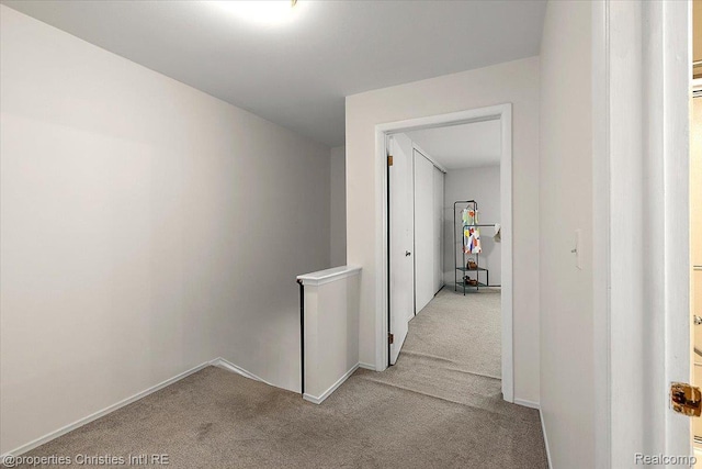 1982 Wickham St, Royal Oak, MI 48073 - hallway with carpet floors and an upstairs landing