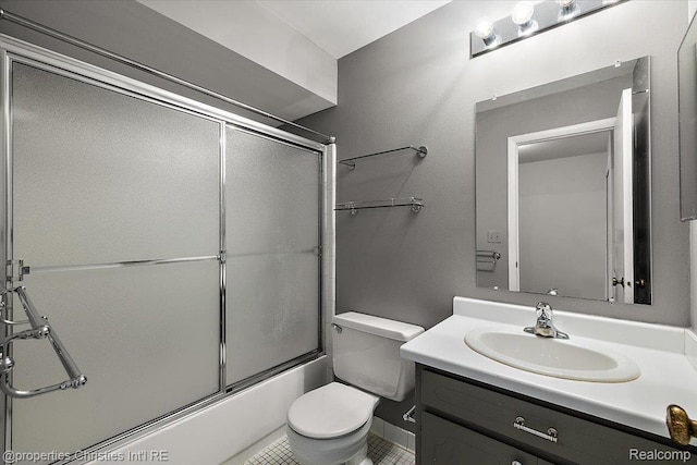 1982 Wickham St, Royal Oak, MI 48073 - full bathroom featuring vanity, combined bath / shower with glass door, and tile patterned flooring