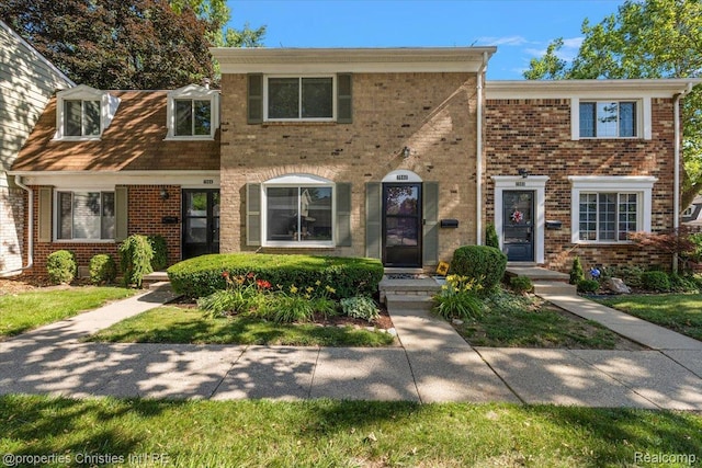 1982 Wickham St, Royal Oak, MI 48073 - townhome / multi-family property featuring brick siding