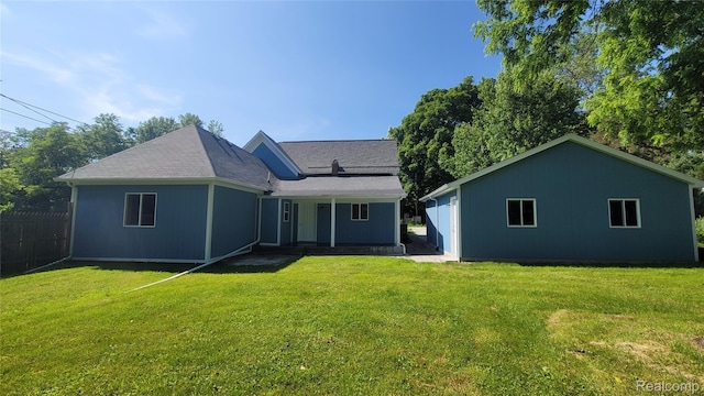 9630 Lambs Rd, Goodells, MI 48027 - back of property with covered porch and roof with shingles