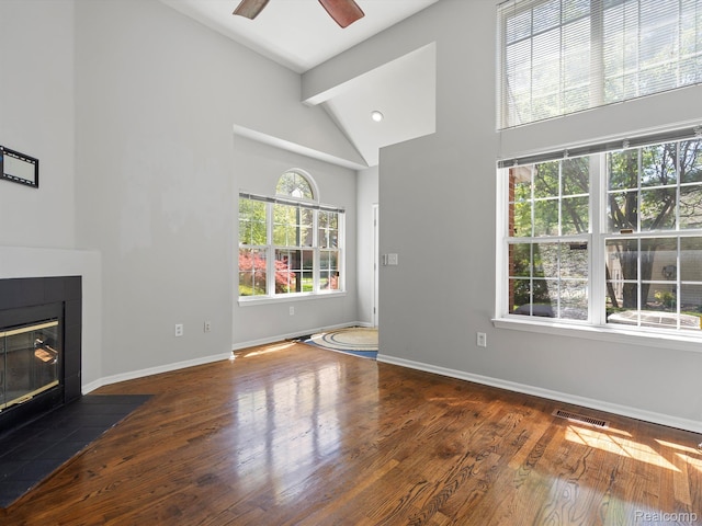 1524 Maryland Club Dr, Royal Oak, MI 48067 - unfurnished living room featuring high vaulted ceiling, a fireplace, wood finished floors, and a ceiling fan