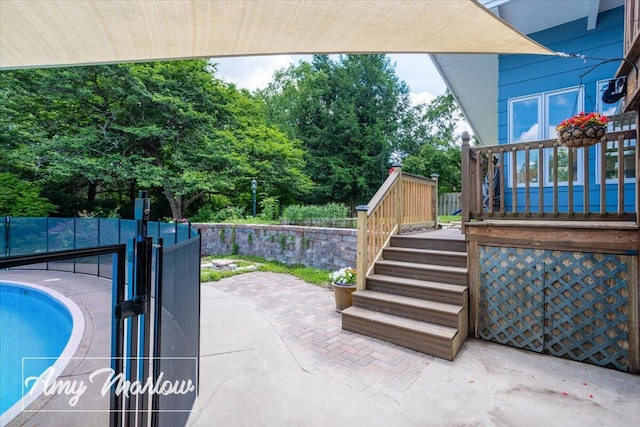 708 Magnolia Ct, Big Rapids, MI 49307 - view of patio with stairs and a wooden deck