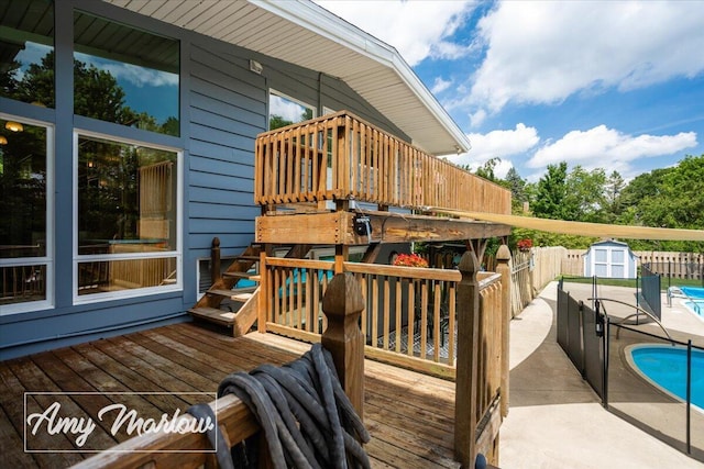 708 Magnolia Ct, Big Rapids, MI 49307 - deck featuring a storage unit and a patio area