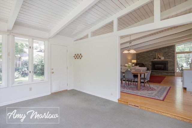 708 Magnolia Ct, Big Rapids, MI 49307 - entryway with a fireplace and a chandelier