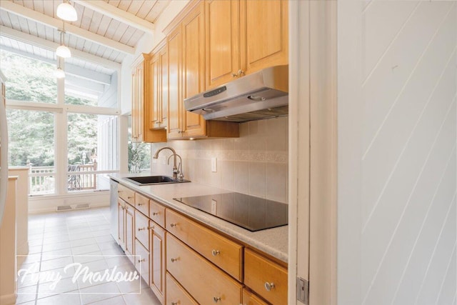 708 Magnolia Ct, Big Rapids, MI 49307 - kitchen with under cabinet range hood, black electric stovetop, decorative backsplash, light tile patterned flooring, and light countertops