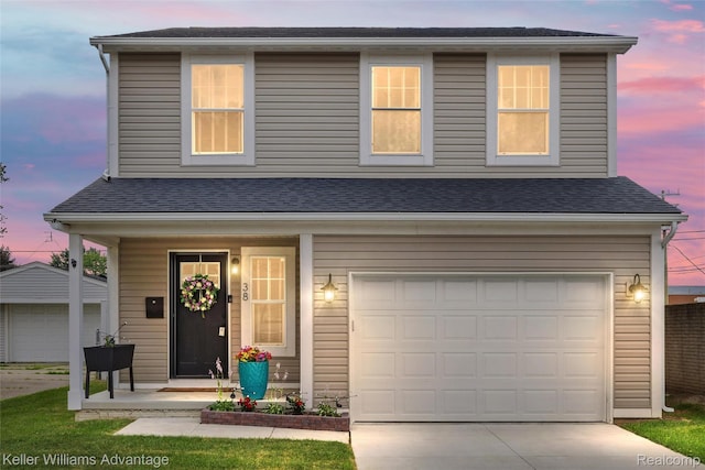 38 E Dallas Ave, Madison Heights, MI 48071 - traditional-style home with driveway, a garage, and roof with shingles