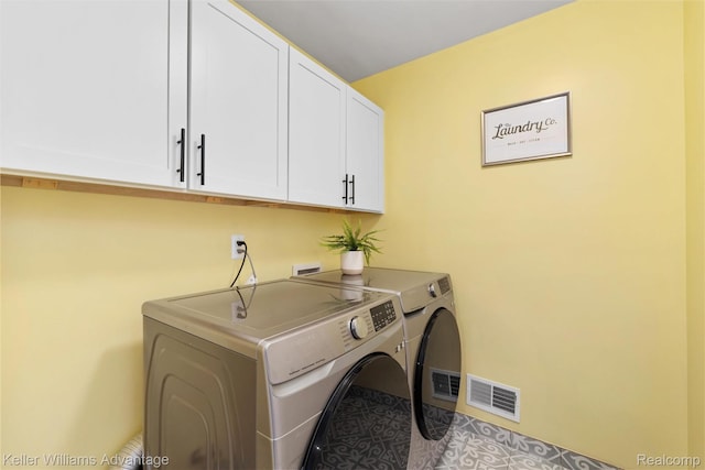 38 E Dallas Ave, Madison Heights, MI 48071 - laundry area featuring cabinet space and washing machine and clothes dryer