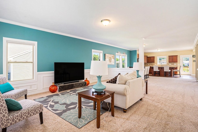 9330 Windward Dr, West Olive, MI 49460 - living room featuring light carpet, ornamental molding, and a wainscoted wall