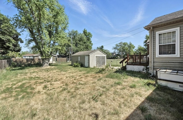 1079 Hurd Ave, Benton Harbor, MI 49022 - view of yard featuring a storage unit and a deck