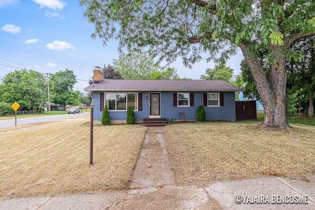 2751 Valley Ave NW, Grand Rapids, MI 49544 - ranch-style house with a chimney