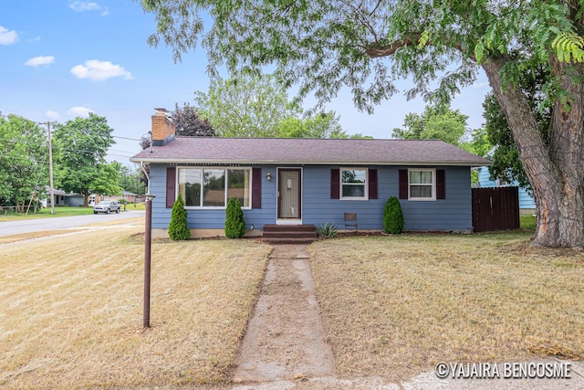 2751 Valley Ave NW, Grand Rapids, MI 49544 - single story home featuring a chimney and a shingled roof