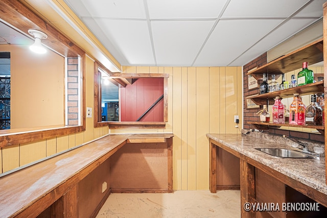 2751 Valley Ave NW, Grand Rapids, MI 49544 - indoor bar with unfinished concrete floors and wooden walls