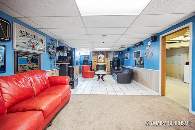 2751 Valley Ave NW, Grand Rapids, MI 49544 - living area featuring a drop ceiling, carpet floors, and washer / clothes dryer