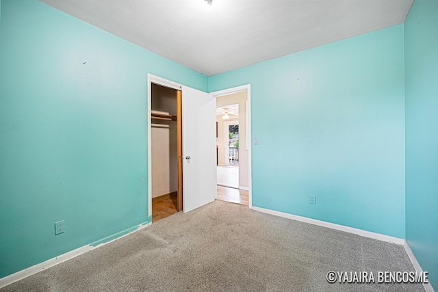 2751 Valley Ave NW, Grand Rapids, MI 49544 - unfurnished bedroom featuring carpet floors and a closet