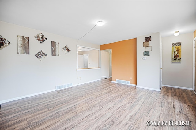 2751 Valley Ave NW, Grand Rapids, MI 49544 - empty room featuring wood finished floors and baseboards