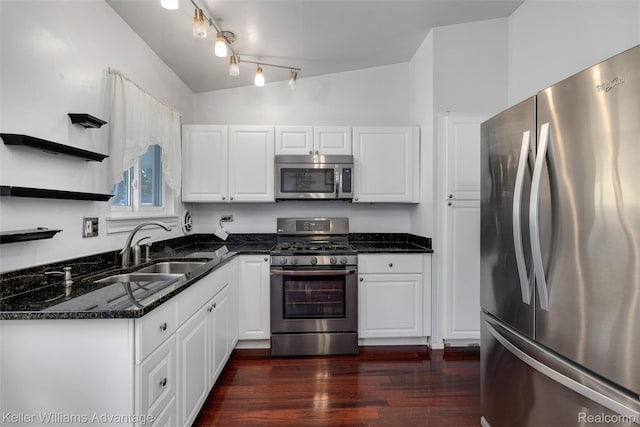 9428 Oak St, Taylor, MI 48180 - kitchen featuring stainless steel appliances, dark wood-style floors, white cabinetry, dark stone counters, and open shelves