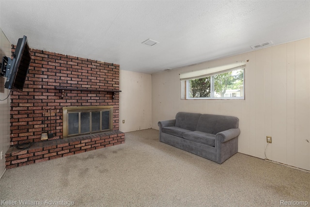 9428 Oak St, Taylor, MI 48180 - carpeted living room with a brick fireplace and a textured ceiling
