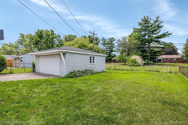 9428 Oak St, Taylor, MI 48180 - view of yard with an outdoor structure and a garage
