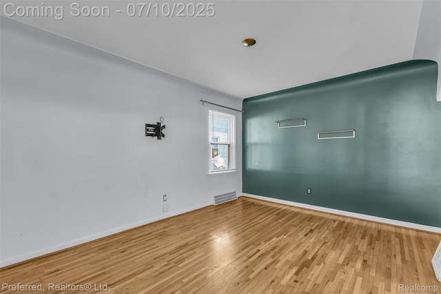 9624 Columbia, Redford, MI 48239 - empty room featuring wood finished floors and baseboards