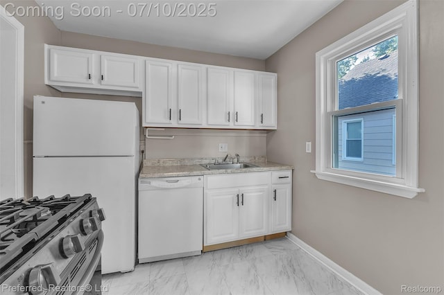 9624 Columbia, Redford, MI 48239 - kitchen featuring dishwasher, stainless steel range with gas cooktop, light marble finish floors, and white cabinetry