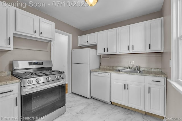 9624 Columbia, Redford, MI 48239 - kitchen featuring white appliances, light marble finish flooring, white cabinetry, and light countertops