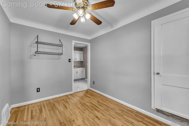 9624 Columbia, Redford, MI 48239 - empty room featuring ceiling fan and light wood finished floors