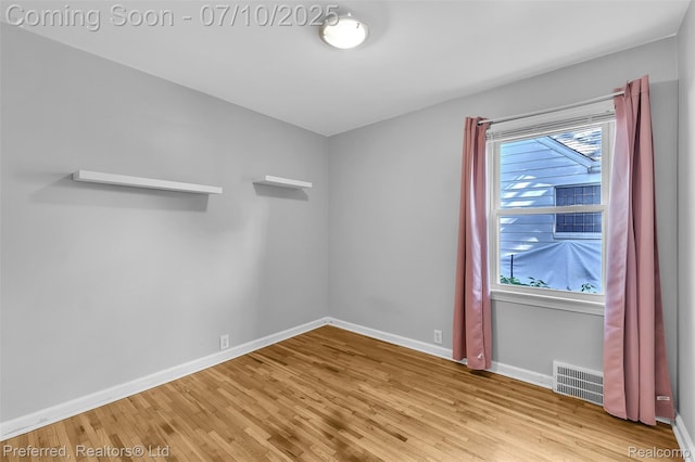 9624 Columbia, Redford, MI 48239 - empty room with wood finished floors and baseboards
