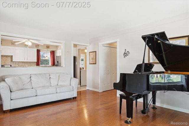 18735 Valade St, Riverview, MI 48193 - living room featuring wood finished floors and ceiling fan