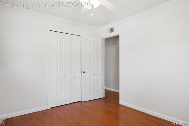 18735 Valade St, Riverview, MI 48193 - unfurnished bedroom with a closet, wood finished floors, and a ceiling fan