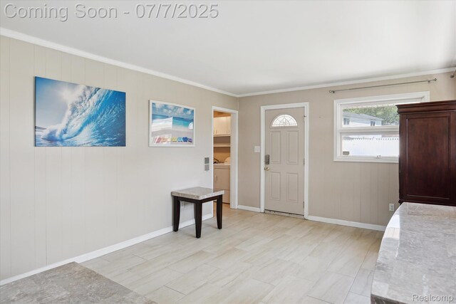 18735 Valade St, Riverview, MI 48193 - foyer with washer / dryer and crown molding