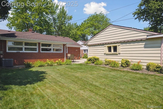 18735 Valade St, Riverview, MI 48193 - view of green lawn with a patio