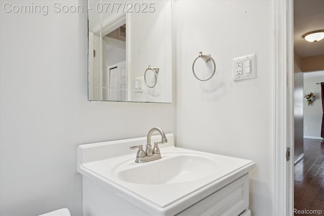 18735 Valade St, Riverview, MI 48193 - bathroom with vanity and wood finished floors