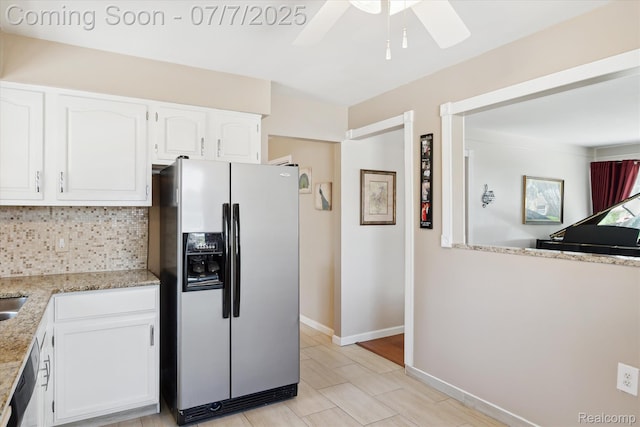 18735 Valade St, Riverview, MI 48193 - kitchen featuring stainless steel refrigerator with ice dispenser, white cabinets, decorative backsplash, a ceiling fan, and light stone counters