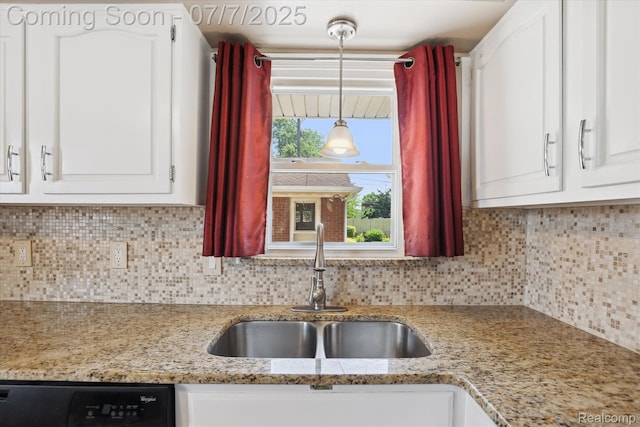 18735 Valade St, Riverview, MI 48193 - kitchen featuring dishwashing machine, white cabinets, tasteful backsplash, light stone counters, and pendant lighting