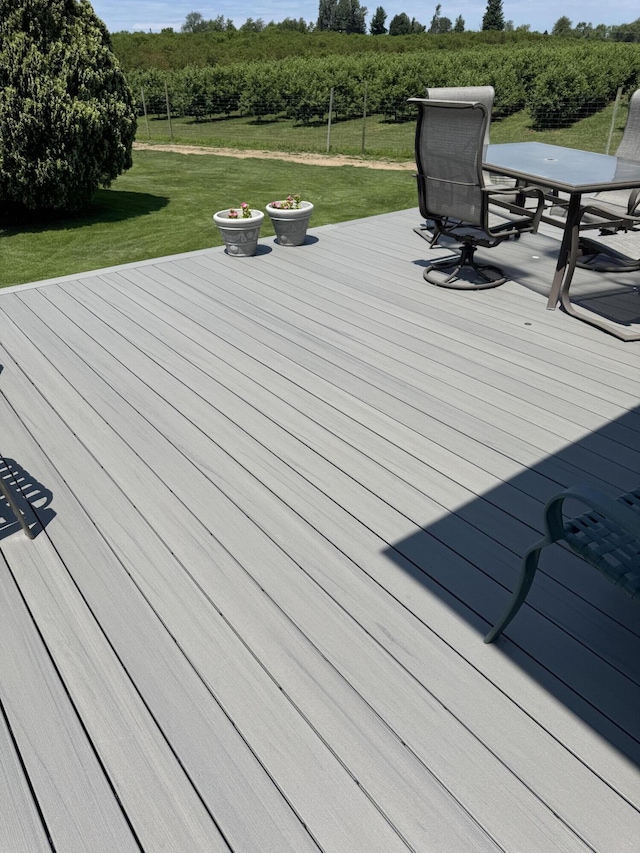 3338 Abbey Rd, Hart, MI 49420 - wooden deck with a yard and outdoor dining space