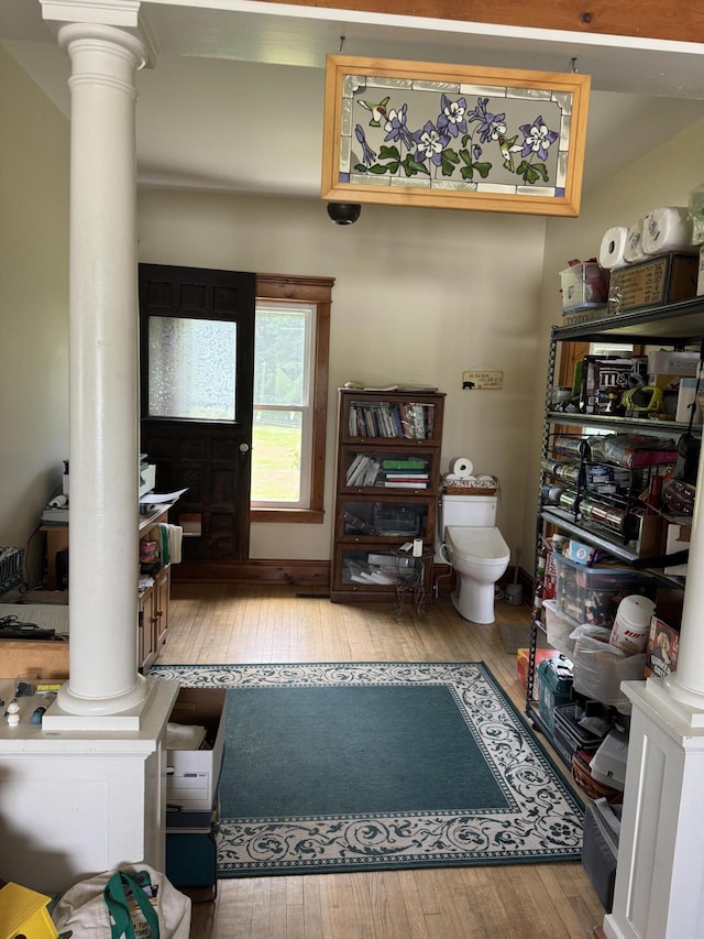3338 Abbey Rd, Hart, MI 49420 - bathroom featuring decorative columns and hardwood / wood-style floors