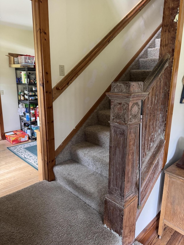 3338 Abbey Rd, Hart, MI 49420 - stairs featuring wood finished floors