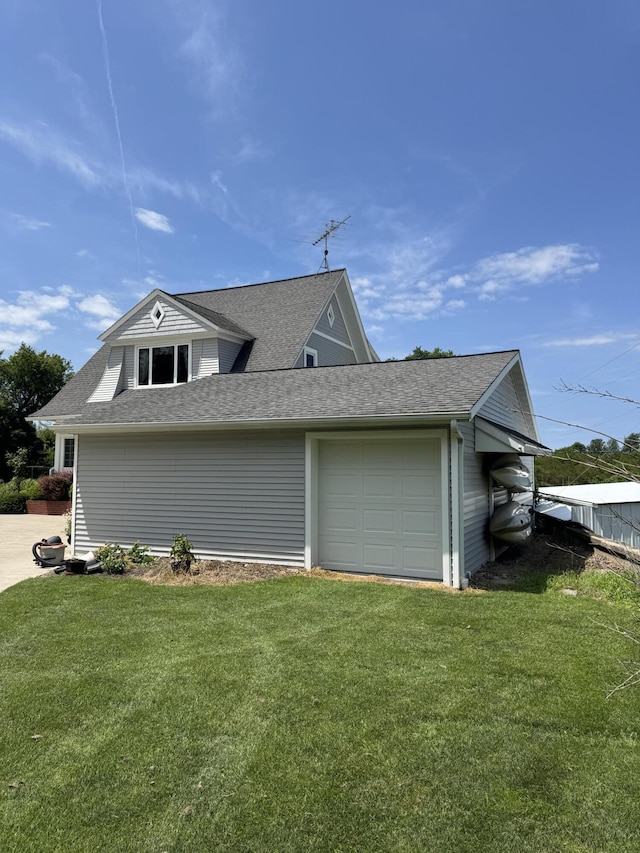 3338 Abbey Rd, Hart, MI 49420 - view of property exterior featuring a yard and roof with shingles
