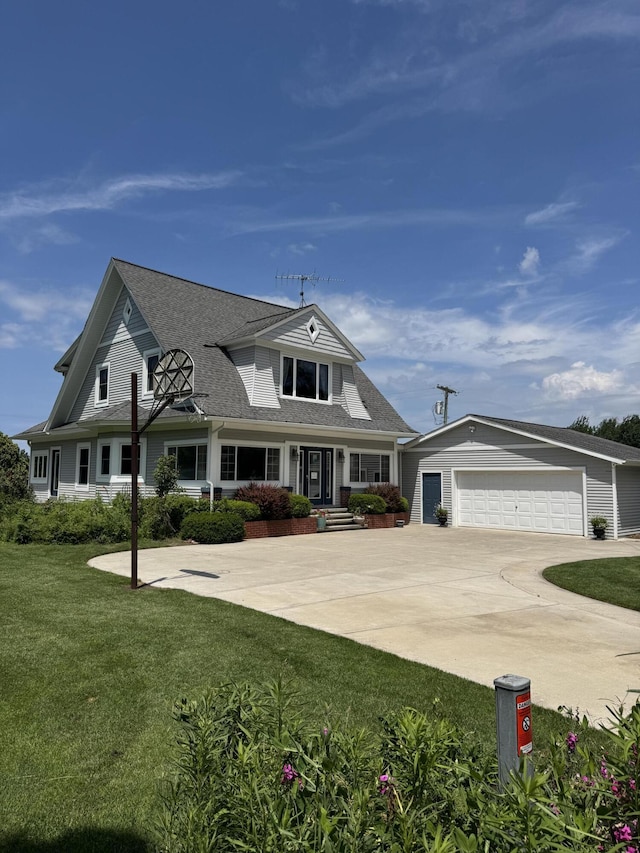 3338 Abbey Rd, Hart, MI 49420 - view of front of property with driveway, a front lawn, a porch, and a shingled roof